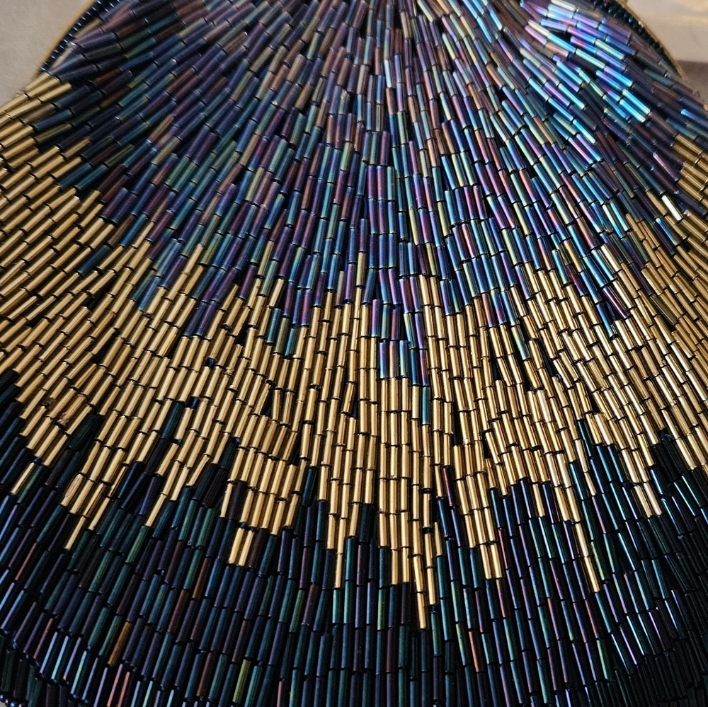 Beautiful new without tags beaded clutch purse.
